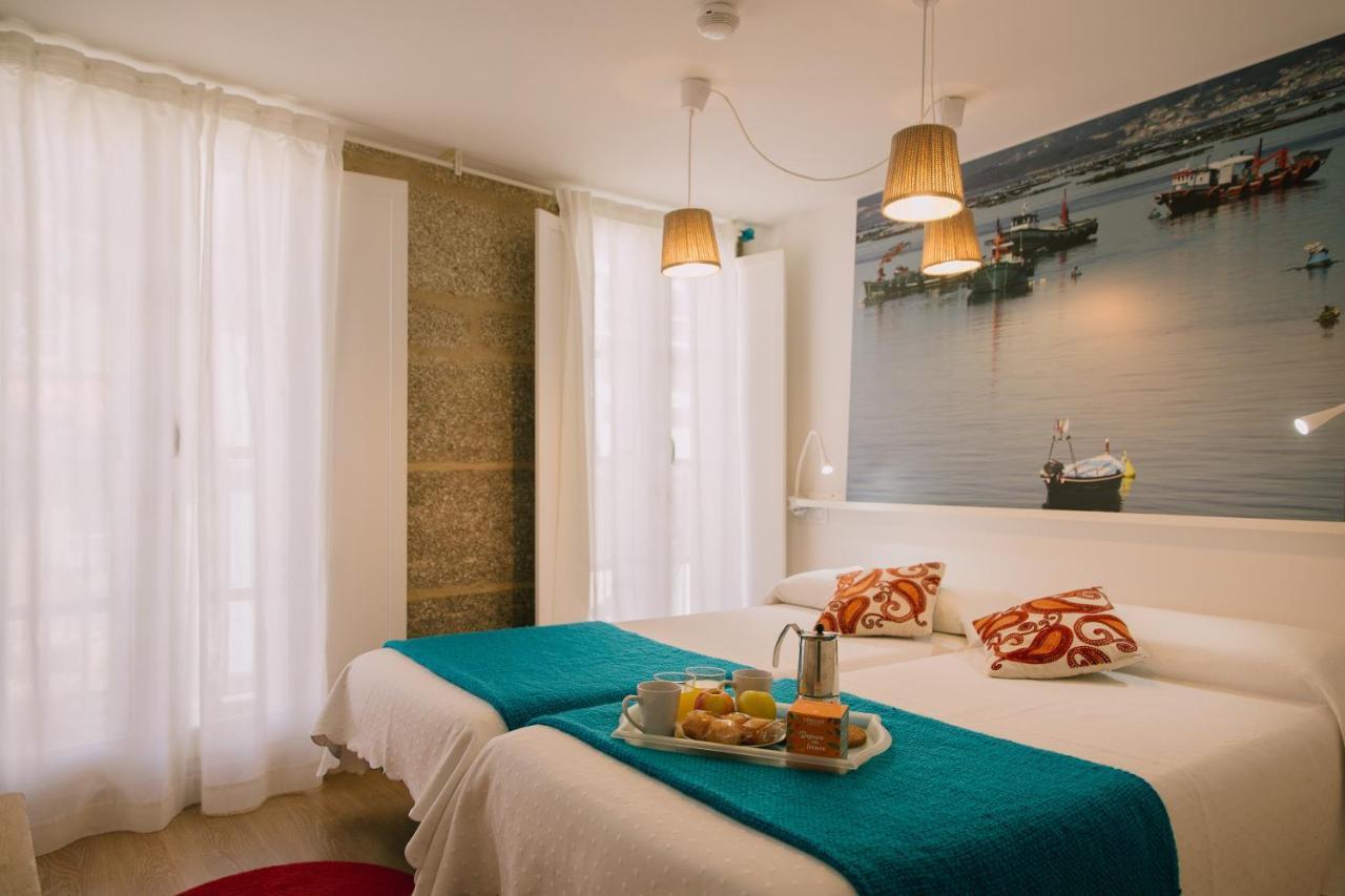 Roompedra Apartamentos Turisticos 圣地亚哥－德孔波斯特拉 外观 照片